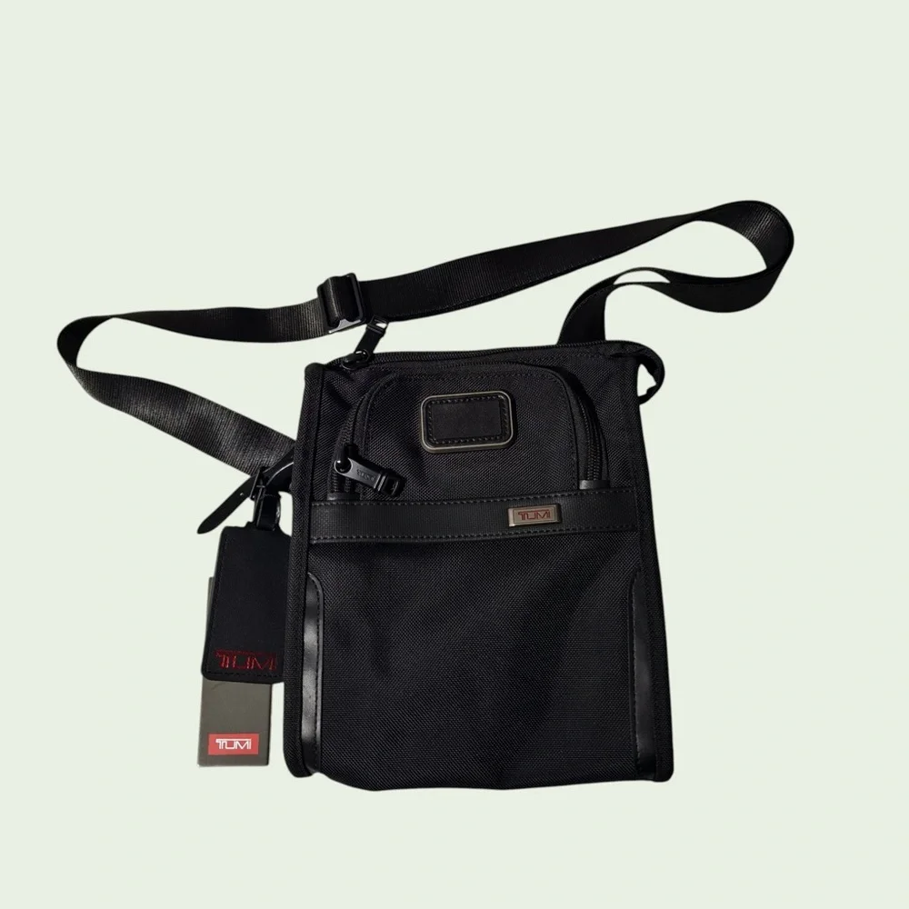 🌺 Tumi Men's Black Vertical Ballistic Nylon Shoulder Bag
